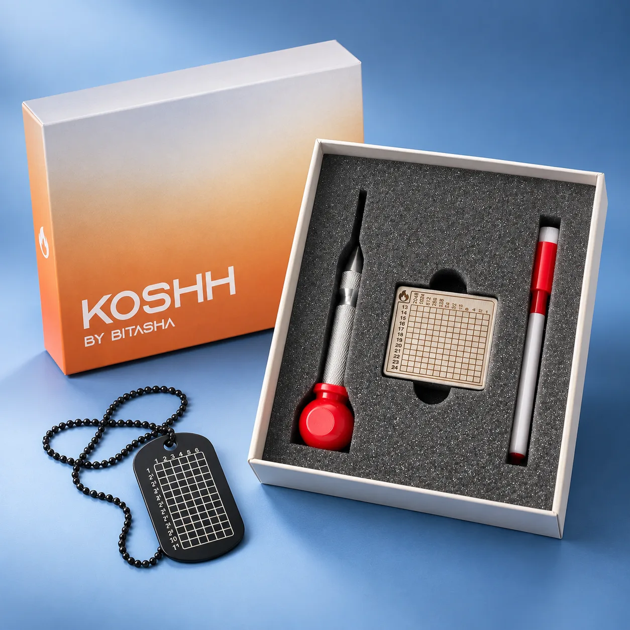 Koshh by Bitasha kit with metal plate, etching punch and marker, and a black KoshhTag