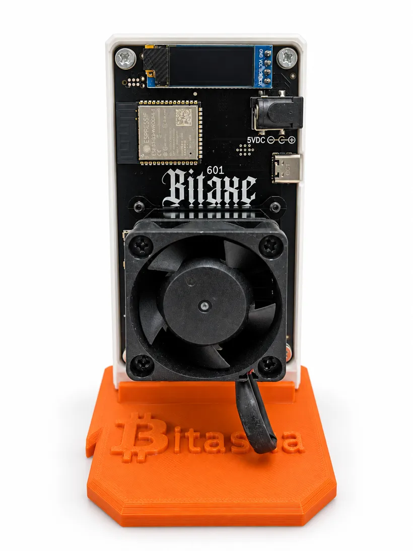 Bitaxe Gamma 601 home miner on its orange Bitasha stand, front view