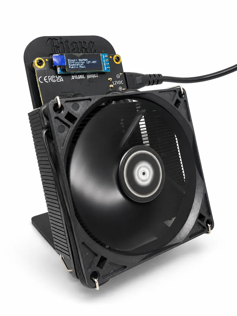 Bitaxe Gamma 801 miner with its large fan, three-quarter view
