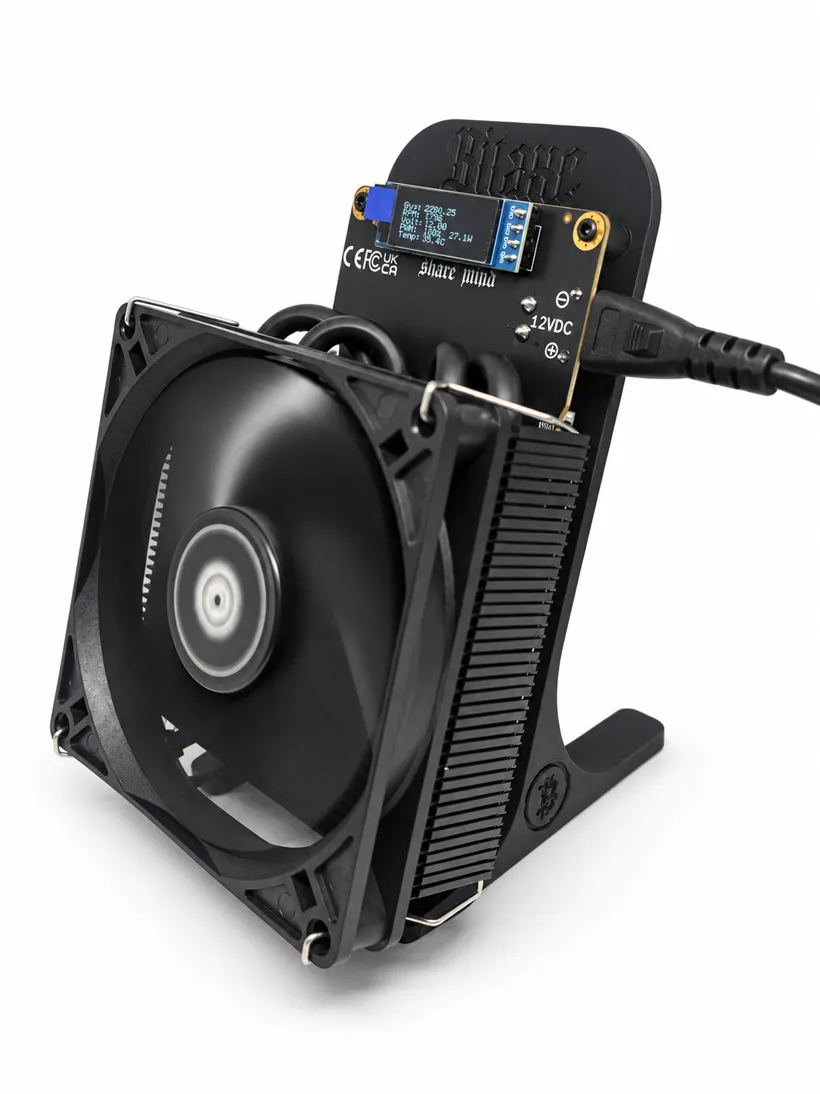 Bitaxe Gamma 801 miner, side view with power cable